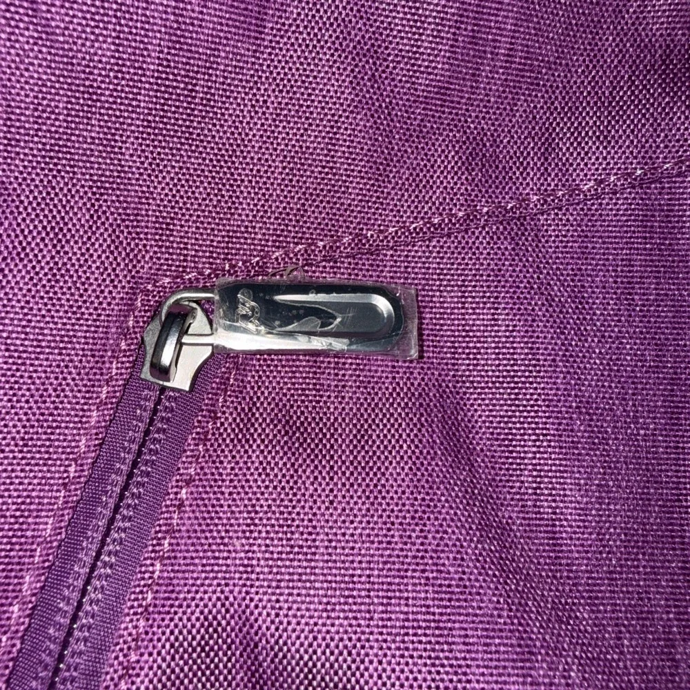 Nevo Rhino Sling Crossbody Bag Back Pack Backpack New W/O Tags Purple or Pink